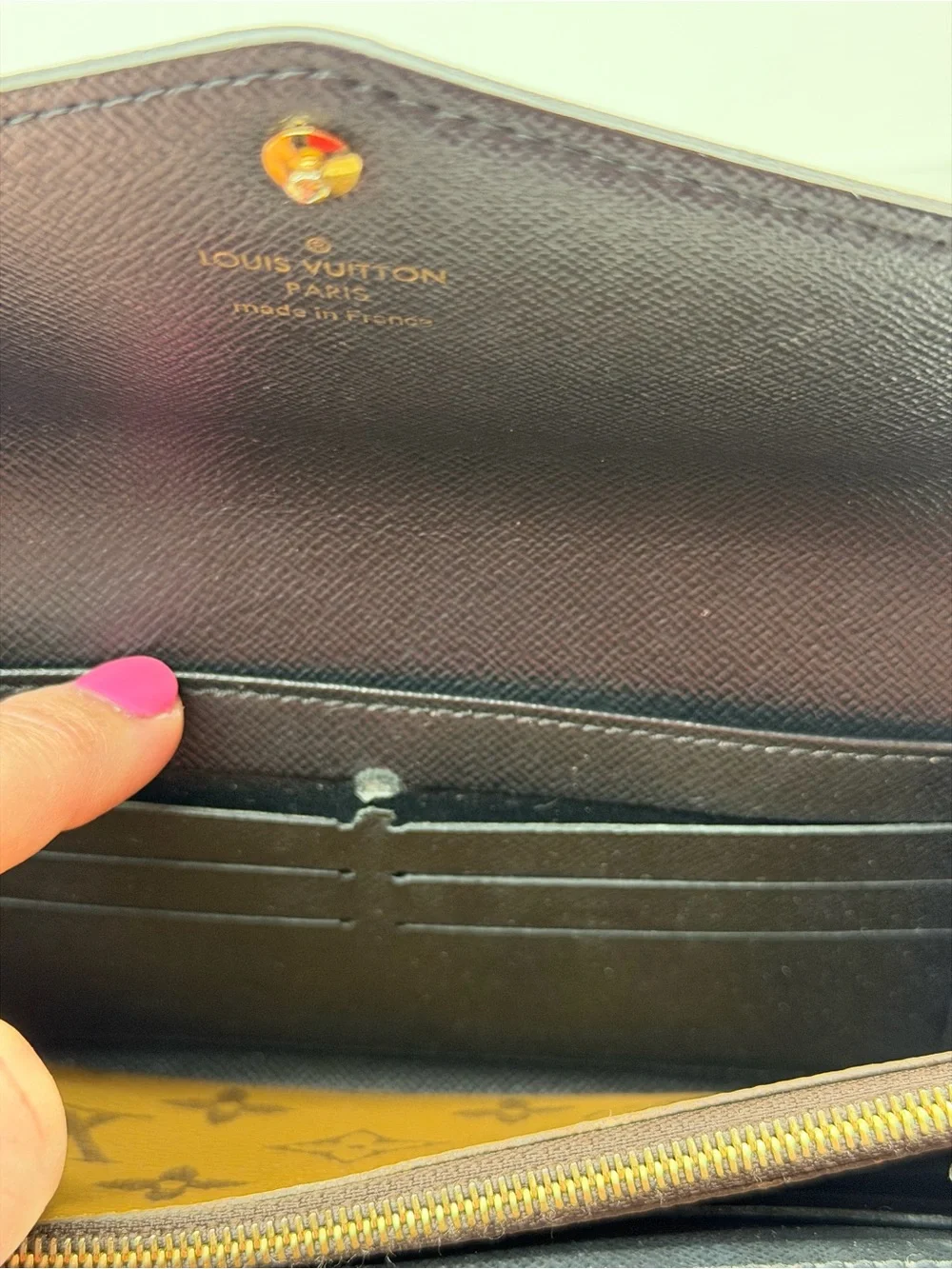 Louis Vuitton Sarah wallet in reverse monogram